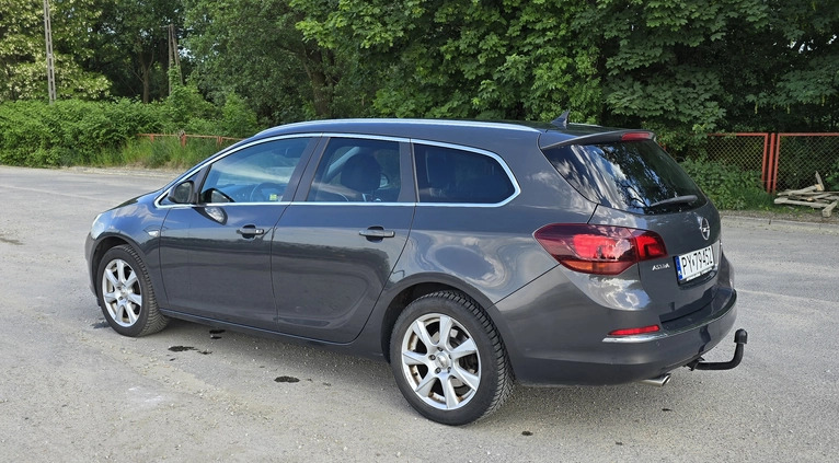 Opel Astra cena 25500 przebieg: 239000, rok produkcji 2014 z Poznań małe 277